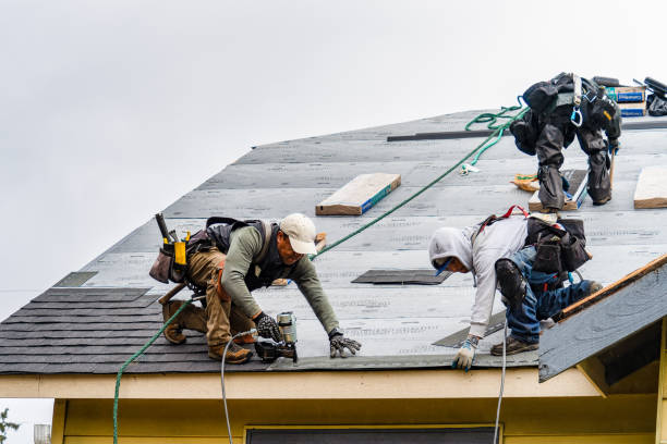 Professional Gutter Installation technician working in Beacon, NY